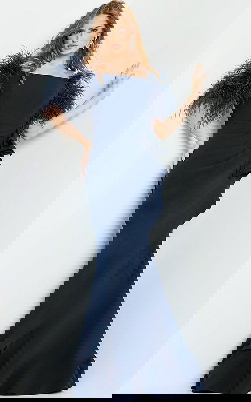 Model wearing Jovani 09154 navy dress, front view, showcasing feathered sleeves.