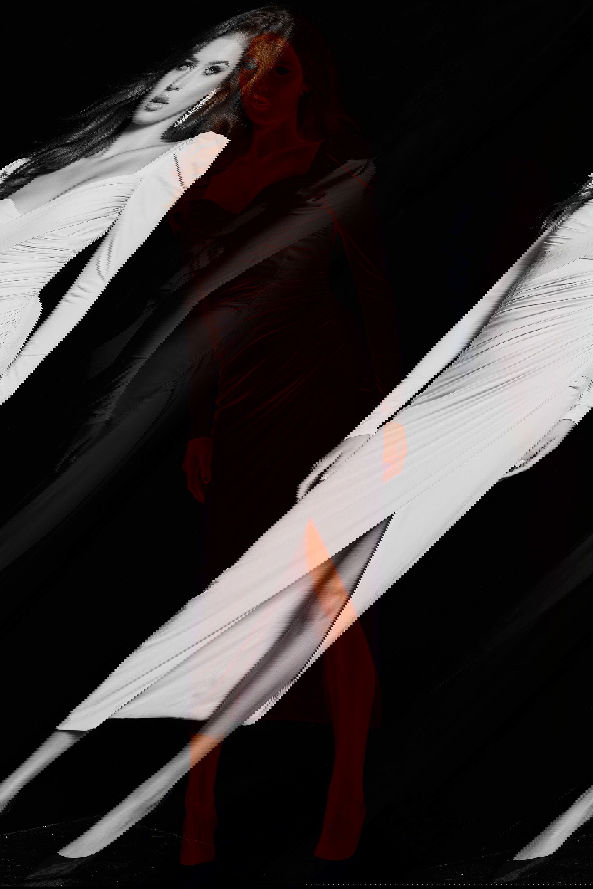 09402-BLUSH-202.jpg Model wearing Jovani 09402 blush dress with long sleeves, sweetheart neckline, and high slit.