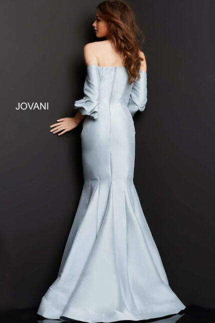 Model wearing Jovani 09420 silver dress, back view highlighting mermaid silhouette