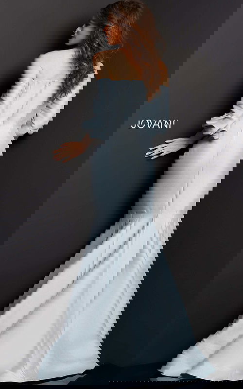 Model wearing Jovani 09420 silver dress, back view highlighting mermaid silhouette