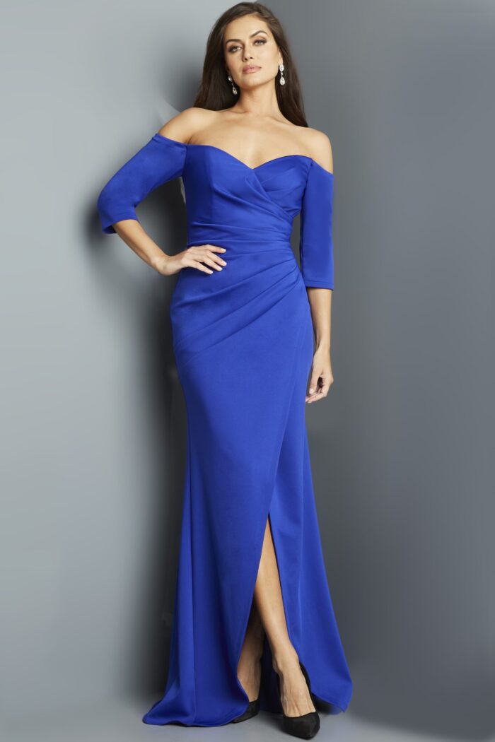 Model wearing Jovani 09421 royal blue gown, front angle with off-the-shoulder neckline.
