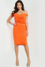 Model wearing Jovani 09423 orange dress with off-the-shoulder neckline and ruching.