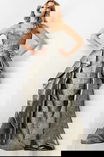 Model wearing Jovani 09481 gown with metallic texture in silver, front view.