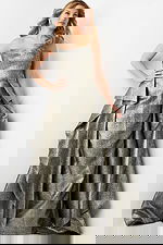 Model in Jovani 09481 showing A-line silhouette and metallic detail in silver.