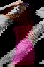 Back view of model in Jovani 09483 hot pink dress with beadwork detail.