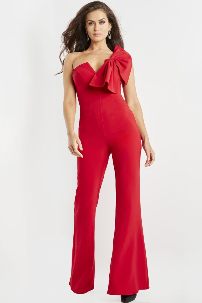 Model wearing Jovani 09525 red jumpsuit, front view with elegant design.