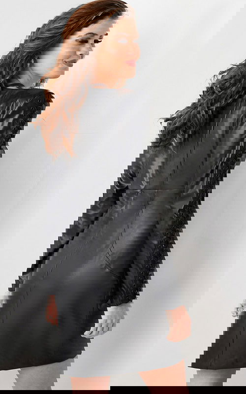 Model wearing Jovani 09585 black mini dress, back view highlighting the detailed long sleeves.