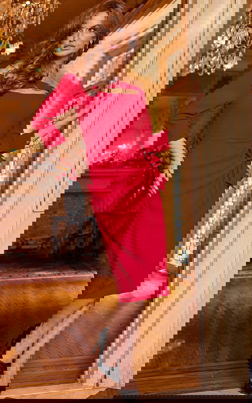 Model wearing Jovani 09624 red dress with an off-the-shoulder neckline and ruffle detail, front view.