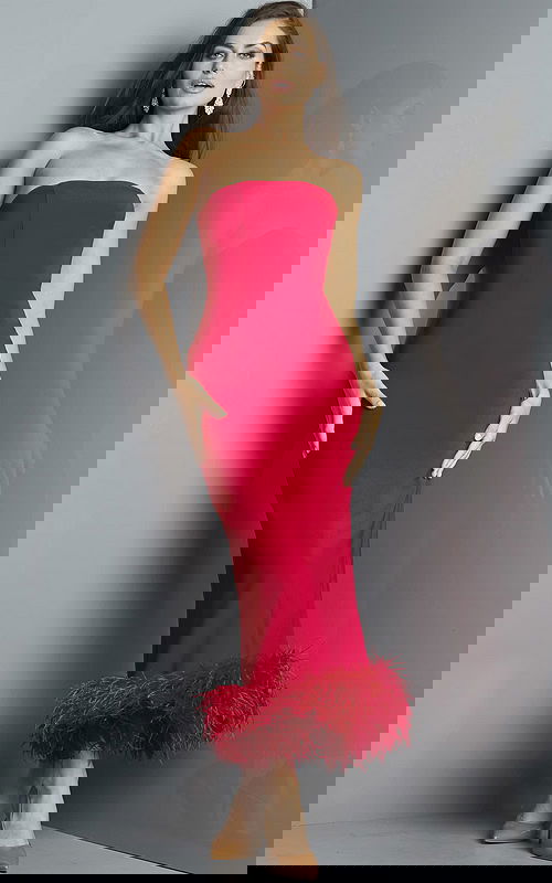 Model wearing Jovani 09630 red dress with feathered hem, front view.