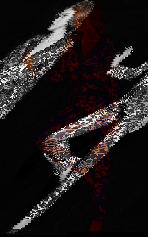 Model wearing Jovani 09680, front view, animal print outfit with sequins