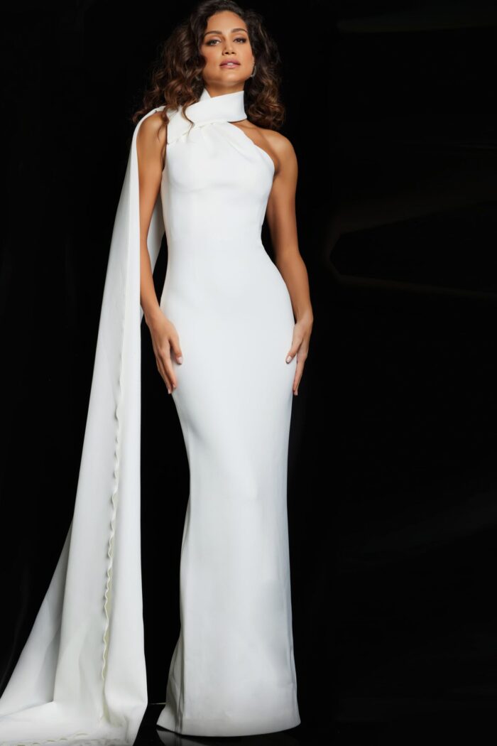 Model wearing Jovani 09709 white sheath dress with high neckline and cascading wrap detail
