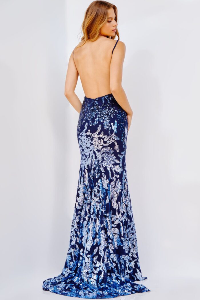 Back view of Jovani 09749 navy gown with open back and embroidered details.