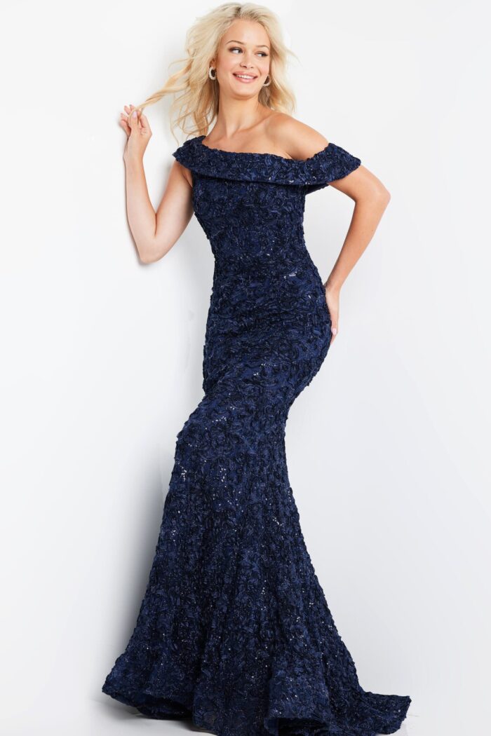model wearing Jovani 09766 navy off-the-shoulder dress with floral appliqués, angled view