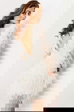 beaded ivory dress with feather hemline and deep v back 09880