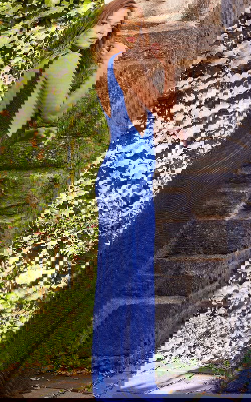 back view of model in Jovani 09891 royal gown with open back design