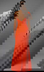 Back view of fitted gown with deep V back and floor length skirt