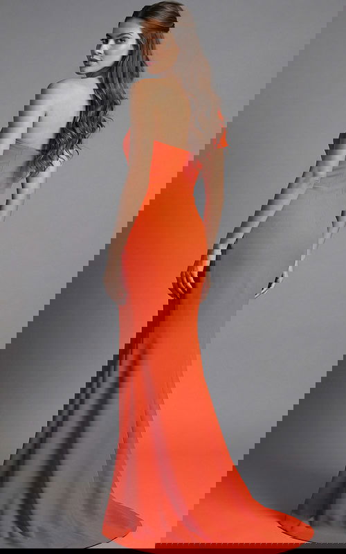 Side view of fitted one shoulder gown with smooth back and flowing hem