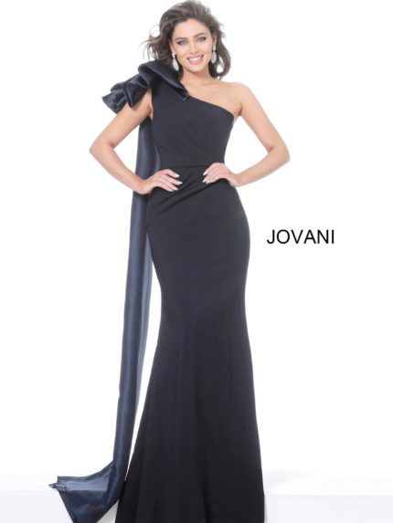 Model wearing Jovani 1008 navy one-shoulder dress with a dramatic ruffle and mermaid silhouette.