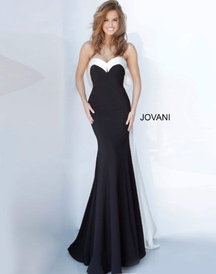 Model wearing Jovani 12020 black mermaid gown with sweetheart neckline