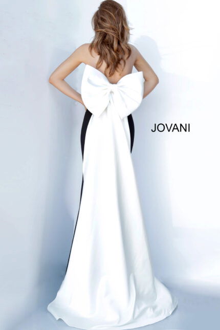 Back view of Jovani 12020 black gown with oversized bow detail