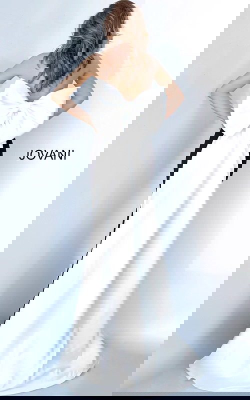 Back view of Jovani 12020 black gown with oversized bow detail