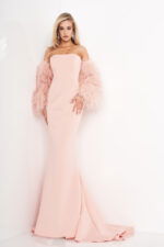 Model wearing Jovani 1226 blush gown with feathered sleeves, front view.