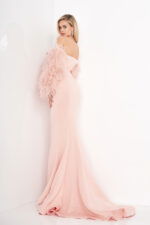 Model wearing Jovani 1226 blush gown with feathered sleeves, back view.
