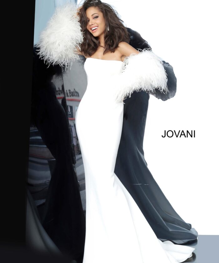 Model wearing Jovani 1226 white gown with feathered sleeves, front view.