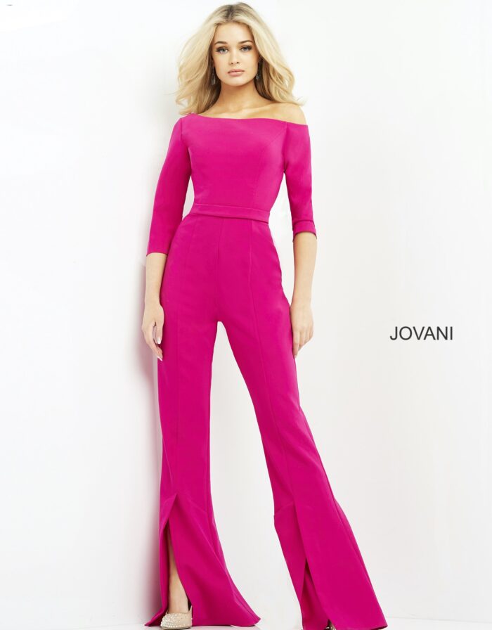 Model in Jovani 1867 fuchsia jumpsuit standing with hands at sides