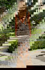 Back view of beaded bridal gown with sheer skirt and geometric embellishments