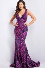 Model wearing Jovani 22314 in purple, highlighting the front with sequin detailing.
