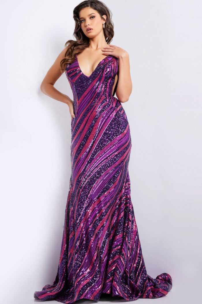 Model in Jovani 22314 dress, showing the back in a purple hue with intricate beading.