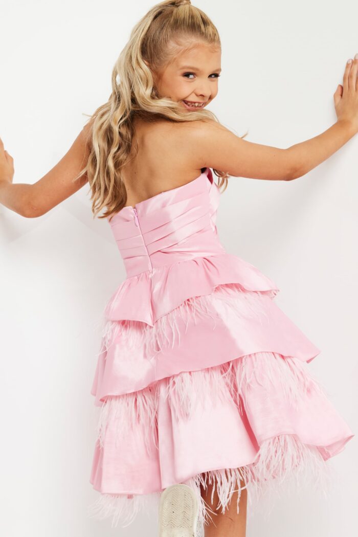 Back view of Jovani K22326 pink dress showing layered design and zipper closure.