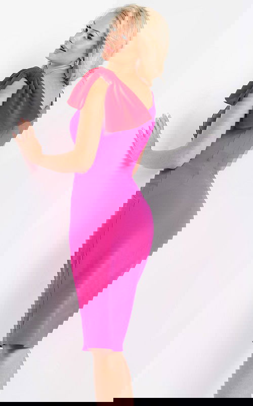 Model wearing Jovani 22576 fuchsia dress, back view highlighting the shoulder bow.