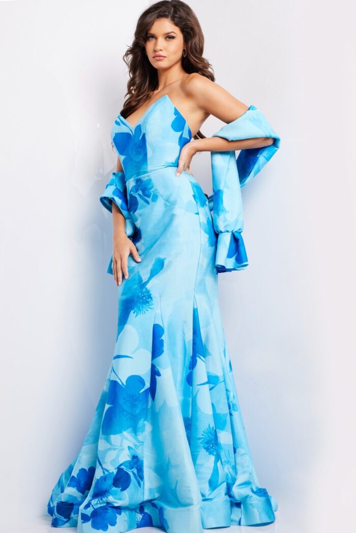 Model showcasing side view of Jovani 22706 blue mermaid gown