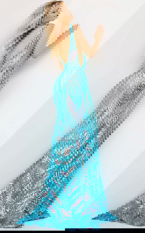 model wearing Jovani 22770 green sequin mermaid gown back view