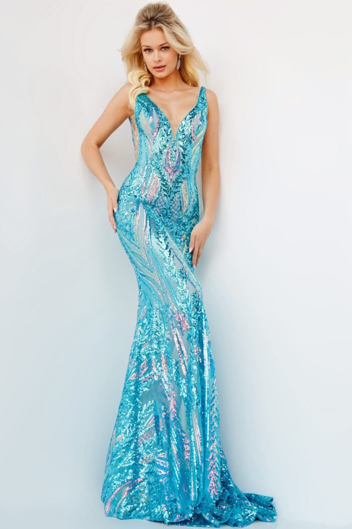 model wearing Jovani 22770 green sequin mermaid gown looking left