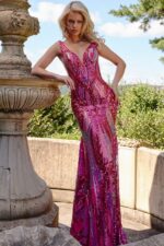 model wearing Jovani 22770 blue sequin mermaid gown side back view