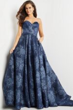 Model wearing Jovani 22792 navy gown showcasing a front view.