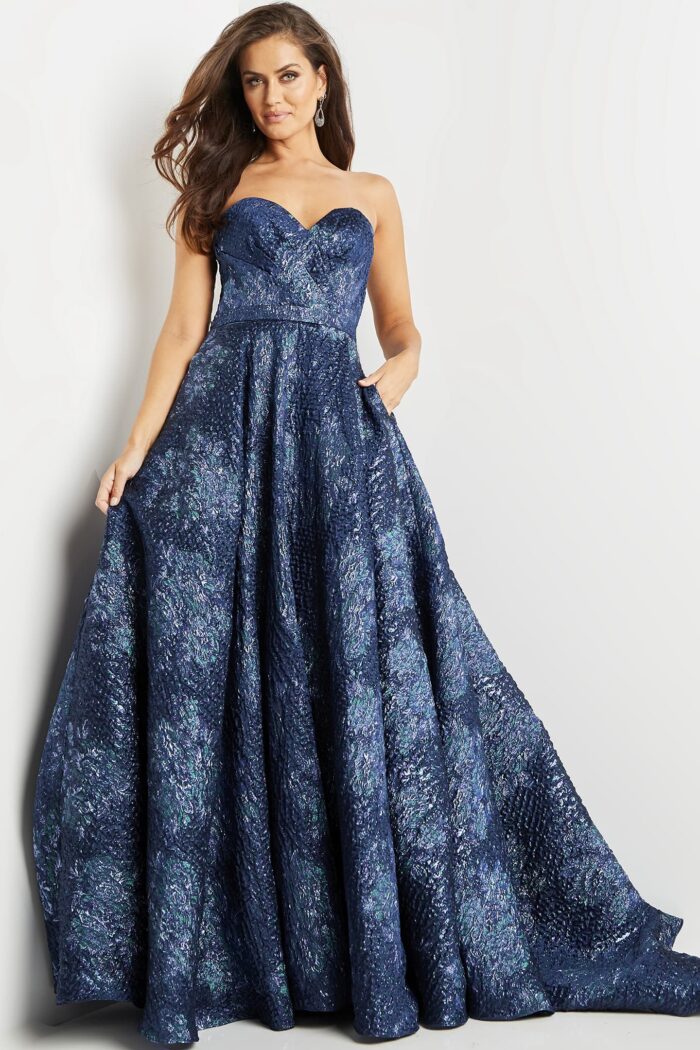 Model wearing Jovani 22792 navy gown showcasing a front view.