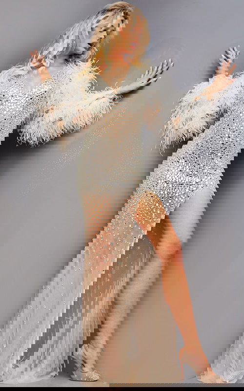 Model displaying Jovani 22848 dress with shimmering details and high slit