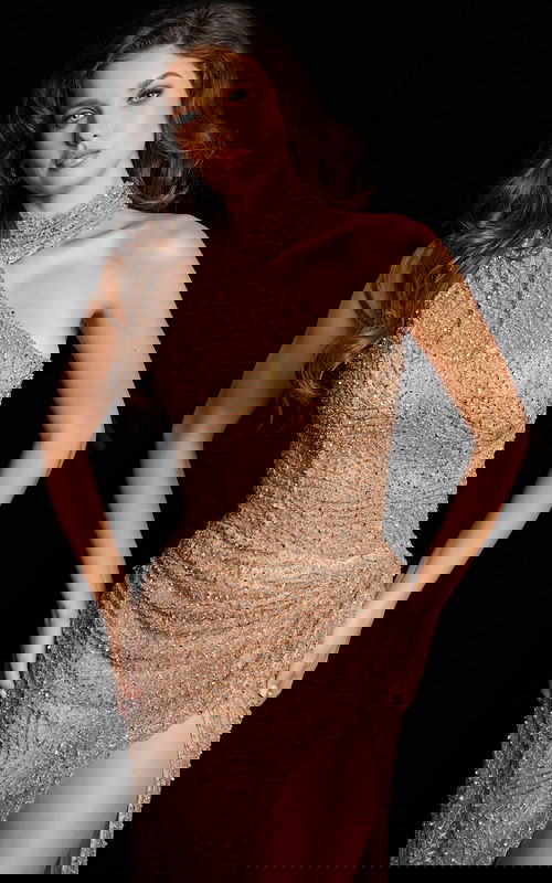 Model showcasing Jovani 22849 gold dress with high neckline embellishments.