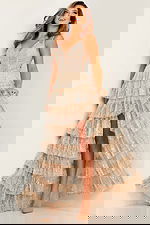 Model in JVN22904 nude ruffled gown showcasing elegant front view