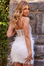 Back view of a model wearing Jovani 22913 white dress, showcasing feather embellishments.