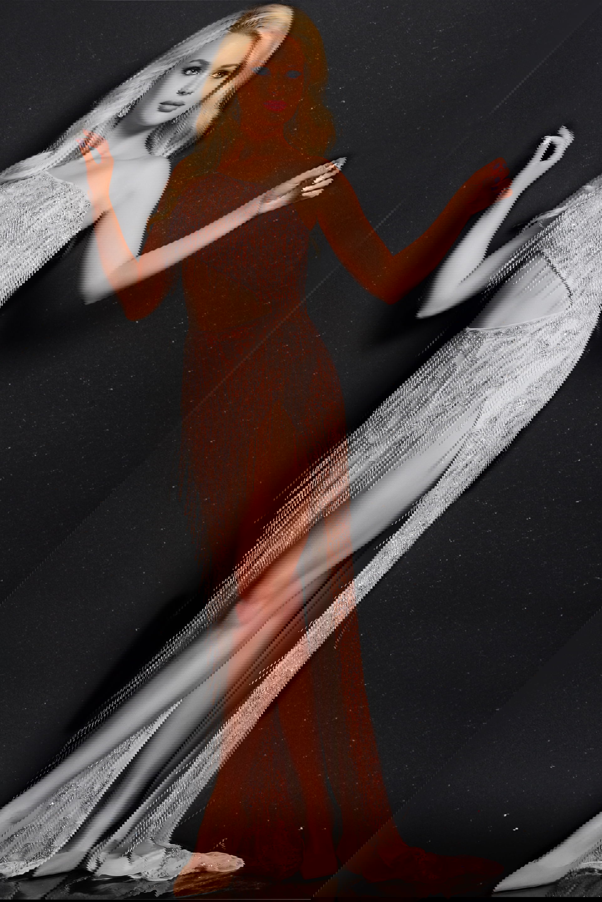 22941_2-fringe.jpg Model wearing Jovani 22941 pink dress with fringe detailing, front view.