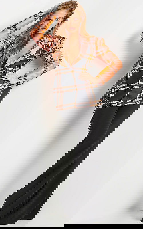 Model wearing Jovani 23002 neon orange plaid blazer dress with black trousers, front view.