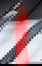 Fitted sequin gown with thin straps, plunging neckline, and smooth floor length silhouette that highlights clean, elegant lines