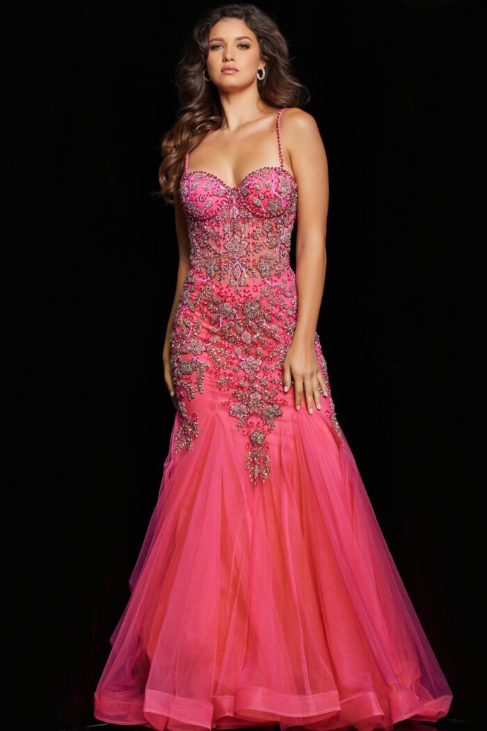 Model showcasing Jovani 23125 full-length pink mermaid gown with sparkling details