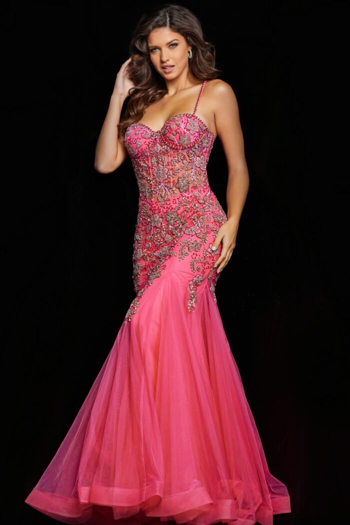 Model wearing Jovani 23125 with intricate beaded bodice and pink tulle bottom in front view