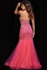 Back view of model in Jovani 23125 highlighting open back and pink tulle mermaid silhouette